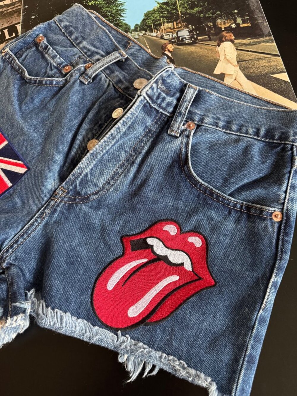 Vintage Levi’s Cutoff Shorts – Rolling Stones Patch | UK Flag | Button Fly | 26”
